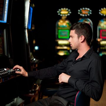 A slot machine player