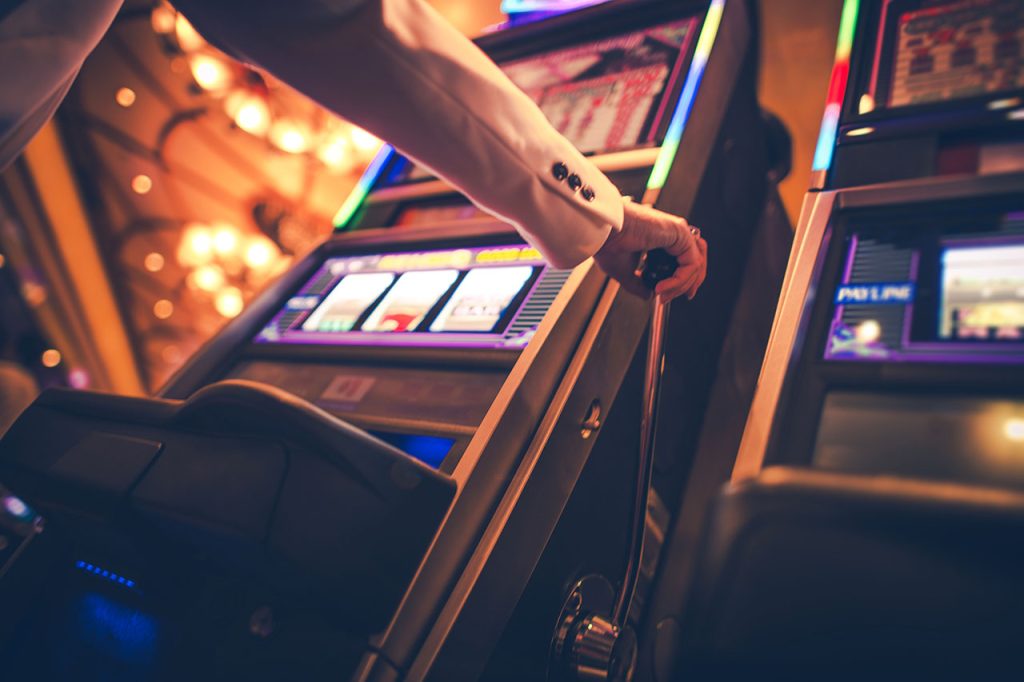 A row of slot machines inside a casino
