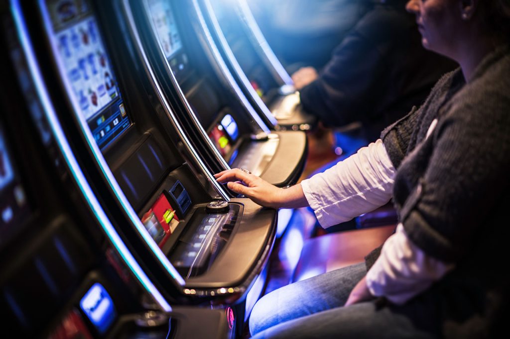 Slot players in a casino.
